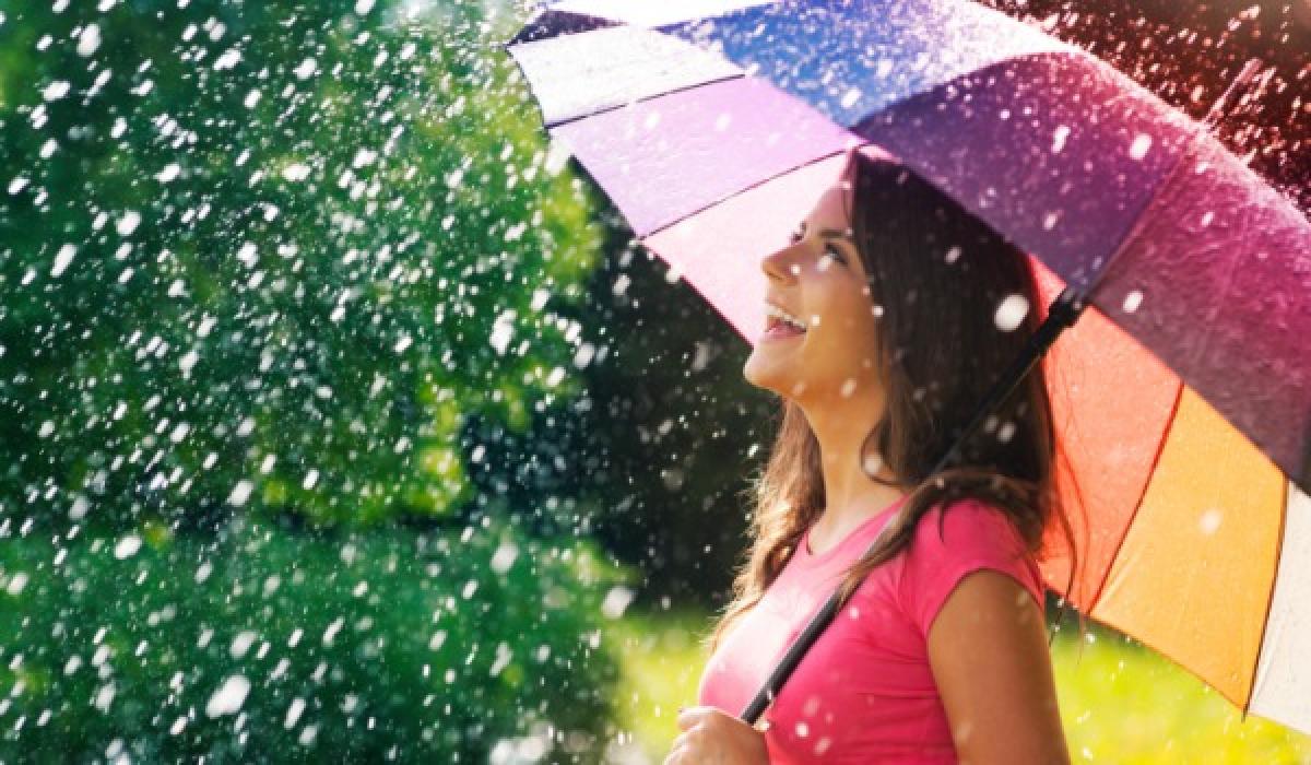 a lady enjoying monsoon